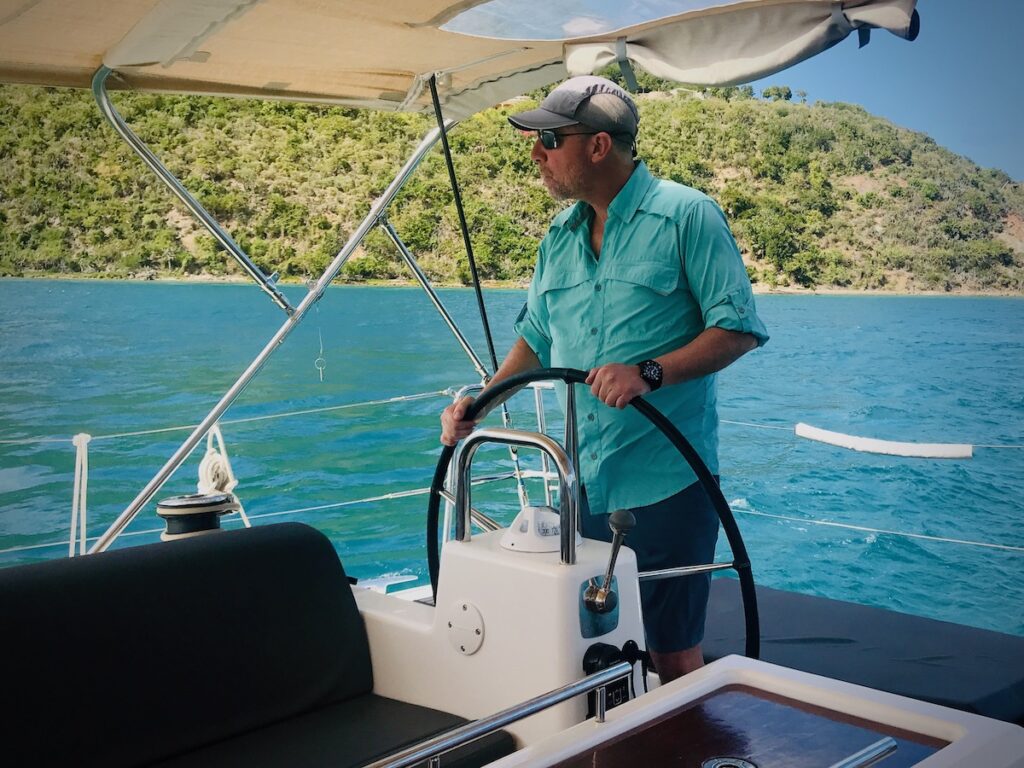 Captain Eric sailing into the Sir Francis Drake Channel aboard a DuFour 460 sailboat in the British Virgin Islands