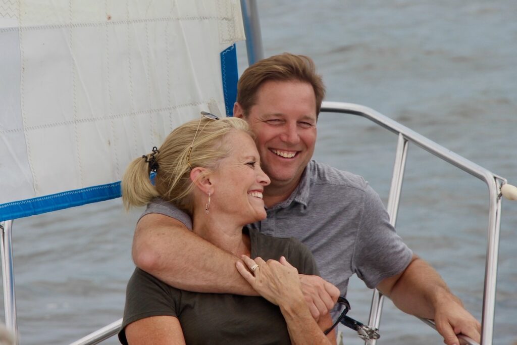 Happy couple sailing on Lake Pepin